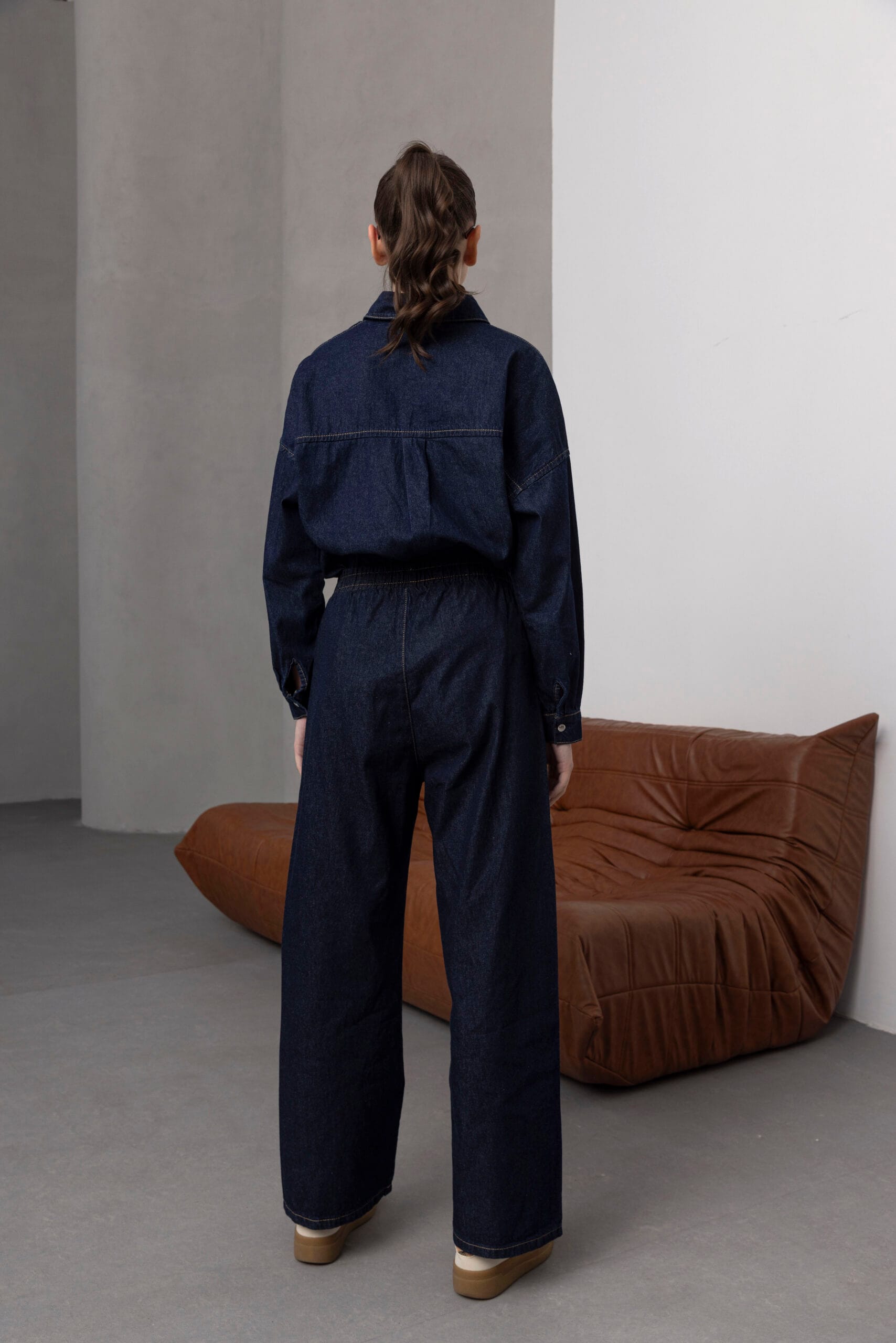 Koyu-Mavi-Bagcikli-Denim-Pantolon